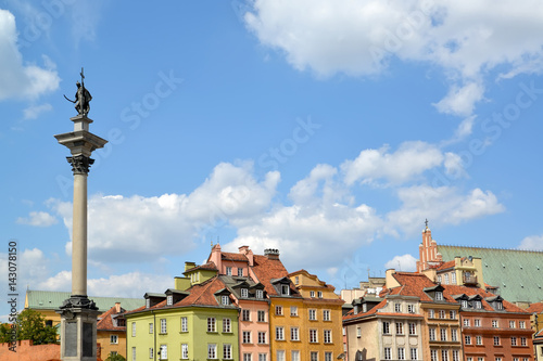 Column of the king Sigismund III against the background of historical buildings. Warsaw, Poland