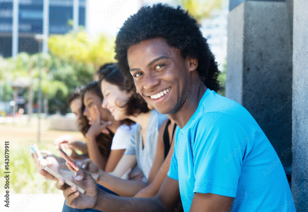 Group of african american man and caucasian and latin woman with cellphone Group of african american man and caucasian and latin woman with cellphone