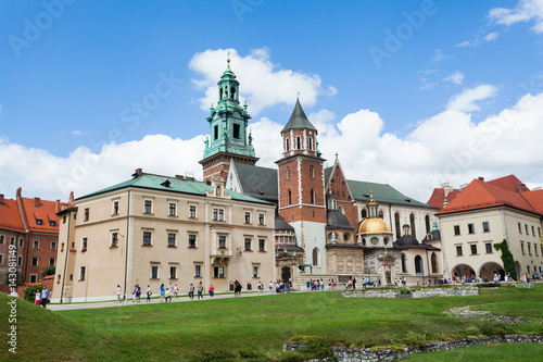 Panoramic view of a Wawel castle and Cathedral with garden in the foreground, Cracow, Poland.