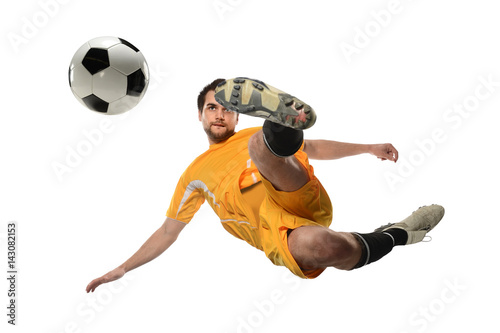 Soccer Player Kicking Ball in Midair © R. Gino Santa Maria