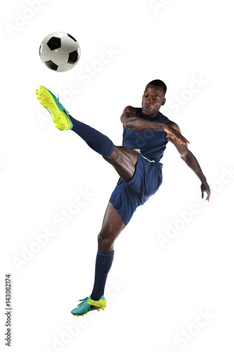 Soccer Player Kicking Ball © R. Gino Santa Maria