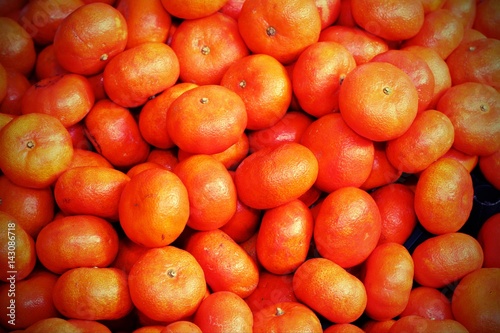 mandarin orange background for sale at the greengrocer
