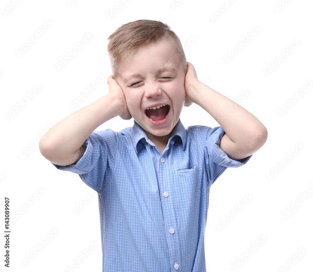 Cute little boy covering ears with hands, on white background Cute little boy covering ears with hands, on white background