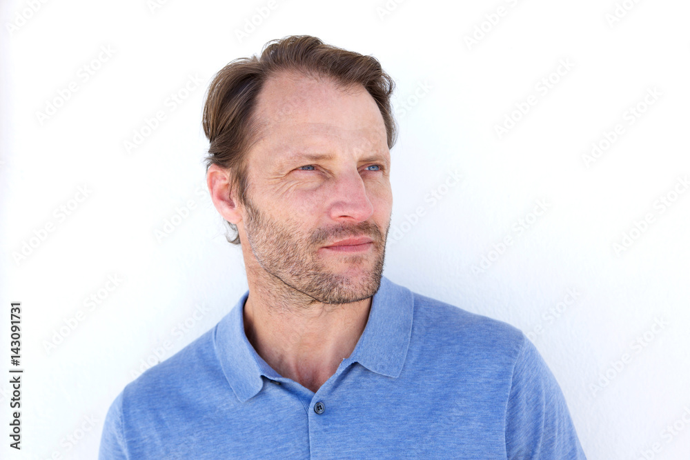 cool guy with serious face expression looking away cool guy with serious face expression looking away
