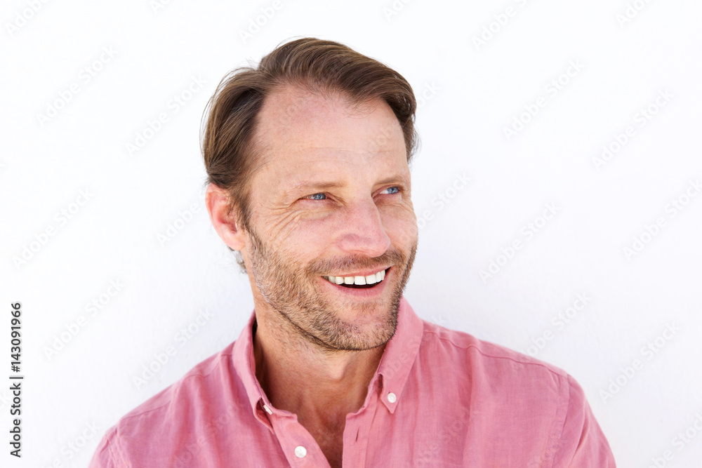 Close up smiling man against white background Close up smiling man against white background