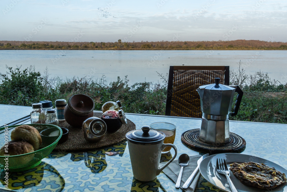 Breakfast over the Niger River in Niger, Africa Breakfast over the Niger River in Niger, Africa