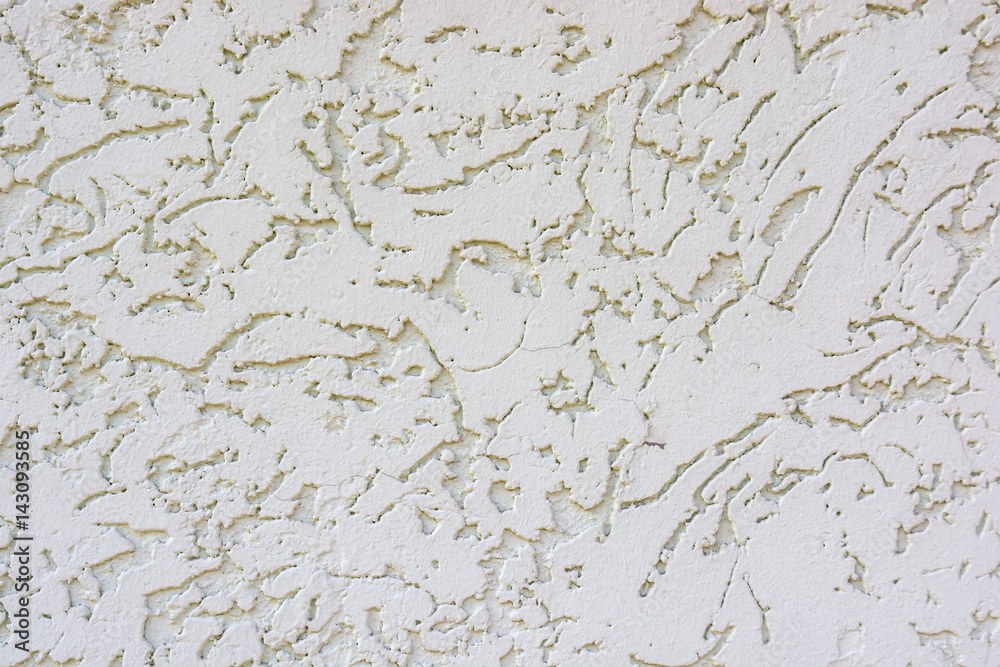 Close up uneven plaster surface texture background Close up uneven plaster surface texture background