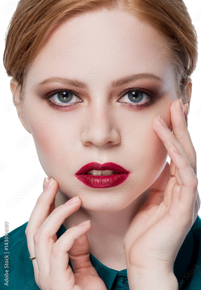 very nice sensual girl with red hair backlit, red lipstick, bright makeup, hands on face looking at the camera close-up, beauty portrait very nice sensual girl with red hair backlit, red lipstick, bright makeup, hands on face looking at the camera close-up, beauty portrait
