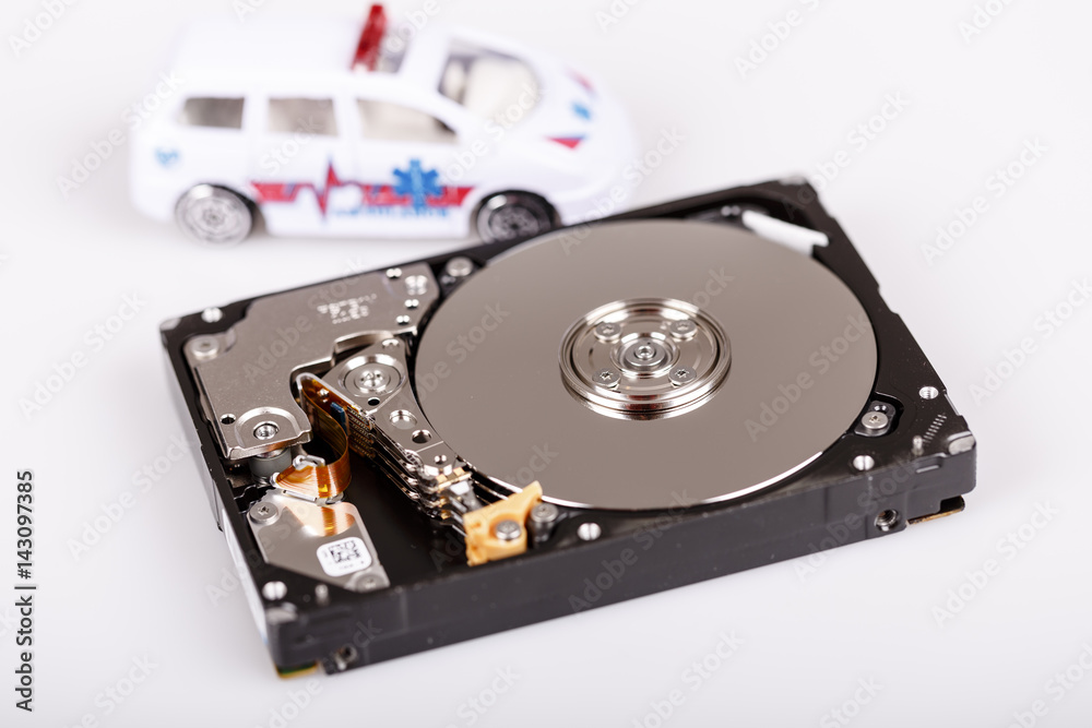ambulance car on harddrive or hdd - data rescue concept ambulance car on harddrive or hdd - data rescue concept