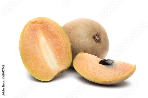 fresh sapodilla fruit isolated on white background photo