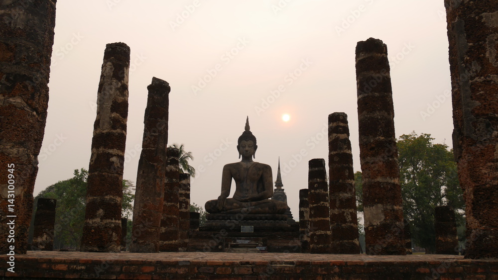 Sunset above the Wat Mahathat Temple  Sukhothai Historical Park, Thailand, a UNESCO Heritage Site. 