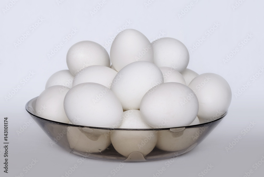 Many white boiled eggs in a plate Many white boiled eggs in a plate