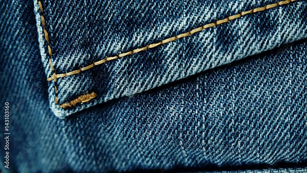 closeup detail of blue denim jeans, texture background 4K ProRes HQ codec closeup detail of blue denim jeans, texture background 4K ProRes HQ codec