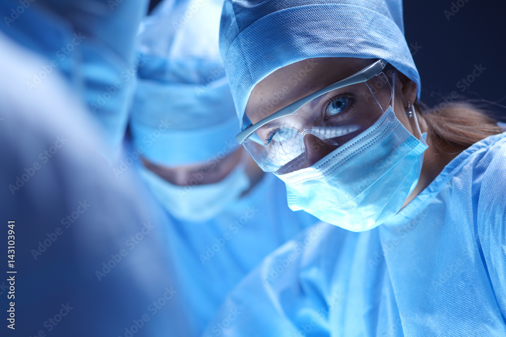 Team surgeon at work on operating in hospital Team surgeon at work on operating in hospital