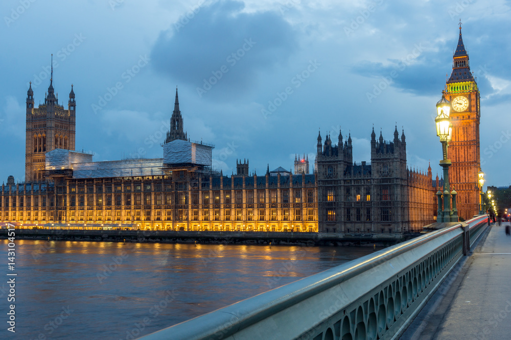 LONDON, ENGLAND - JUNE 16 2016: Night photo of Houses of Parliament with Big Ben from Westminster bridge, London, England, Great Britain