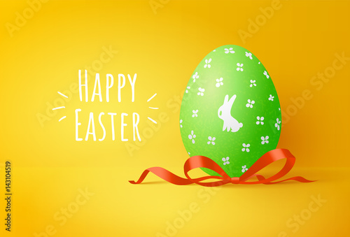 Green easter egg with cute bunny