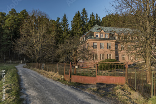 Big palace near forest in Jetrichovice photo