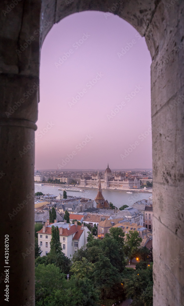 View of The Hungarian Parliament Building Through a Castle Window