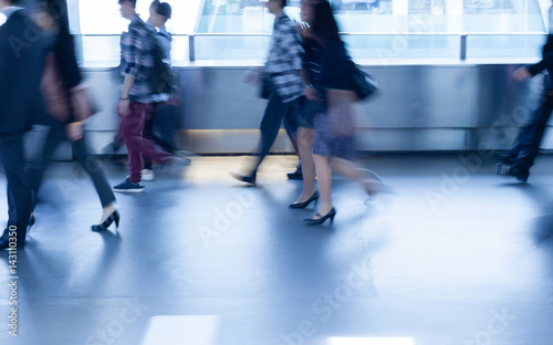 Business people walking the streets of Hong Kong. 