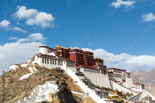 the potala palace against a sunlight sky photo