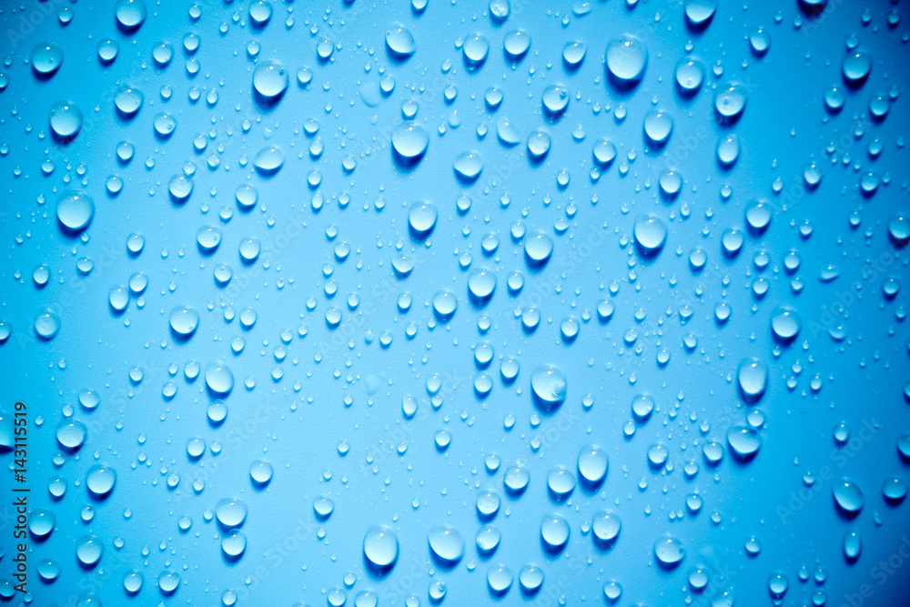 Water drops on blue background.