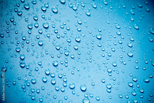 Water drops on blue background.