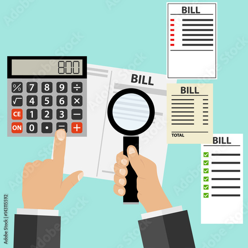 A hand with a magnifier, a calculator and receipts for payment