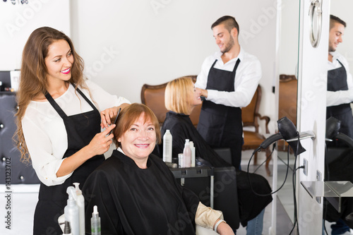Barber makes the cut for woman