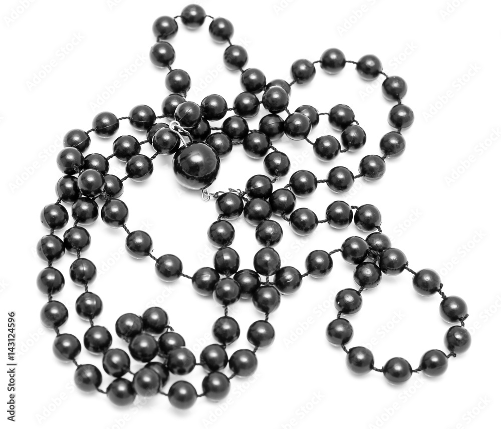 Black beads on a white background Black beads on a white background