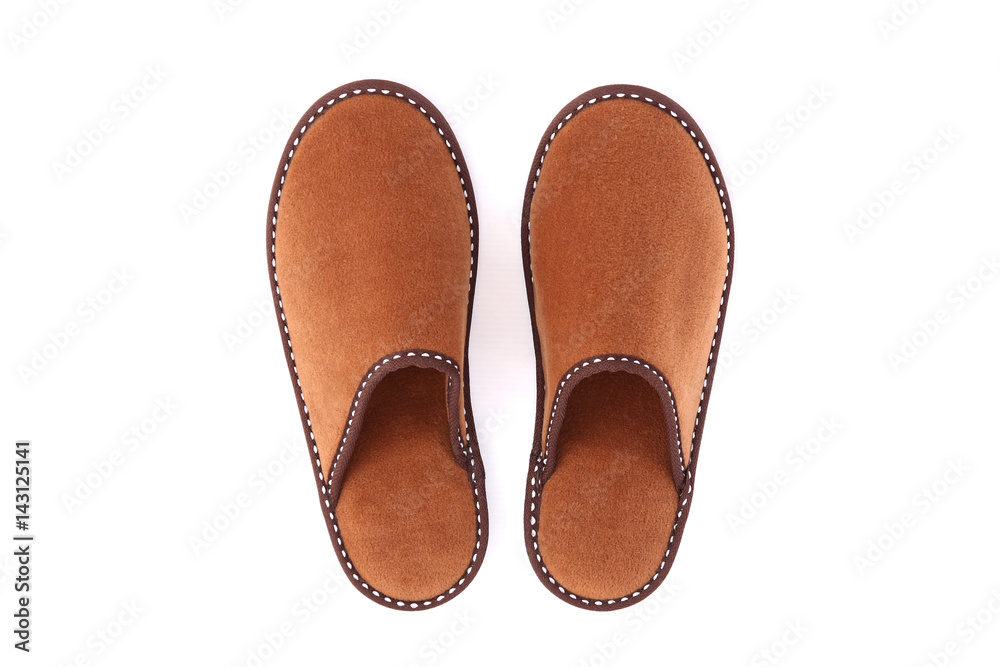 Brown slippers isolated on white background Brown slippers isolated on white background