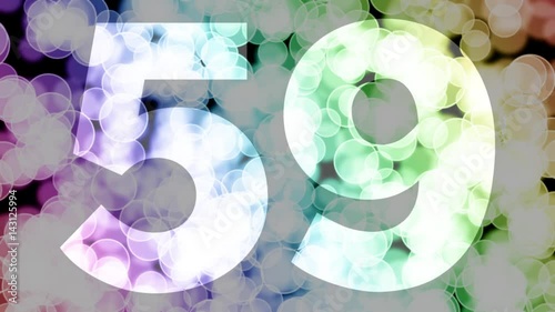 Fifty nine to sixty years birthday fade in/out animation with color gradient moving bokeh background. Animation: 90 frames still with number, 180 fade out, 30 clear, 180 fade in, 300 still. photo