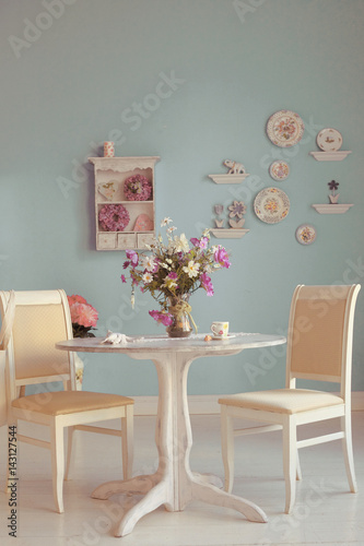 dining room interior with flowers decorative plates Stock Photo | Adobe  Stock