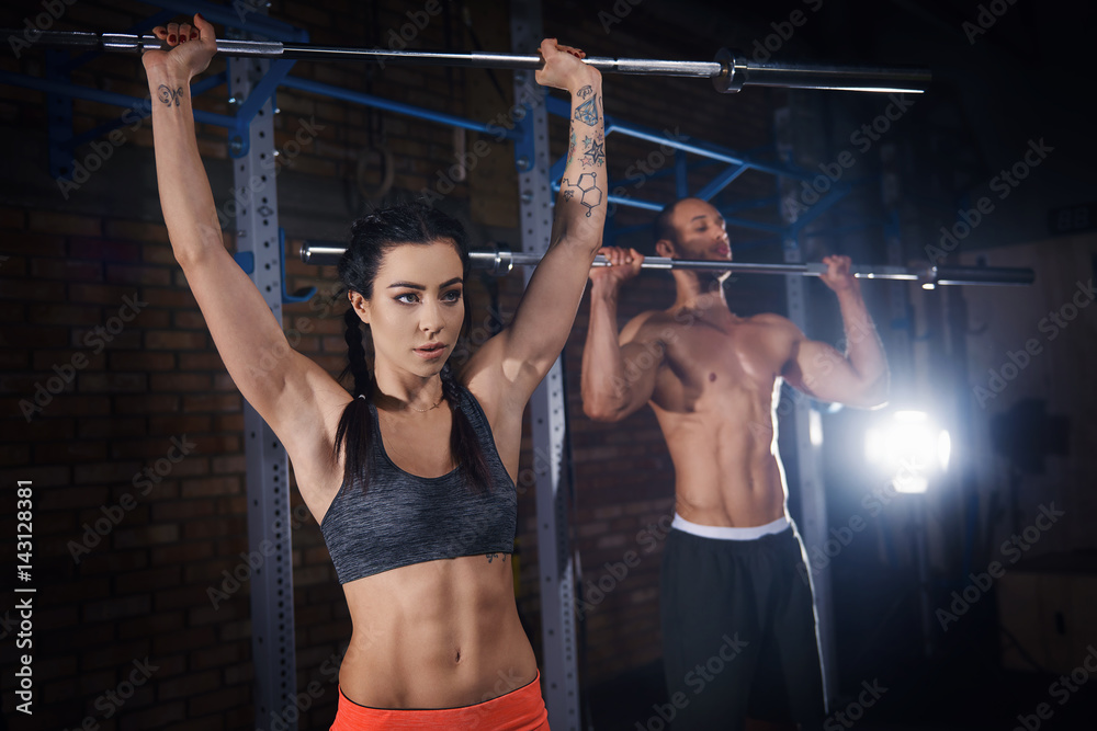 Naklejka premium Build your muscles with barbell exercise