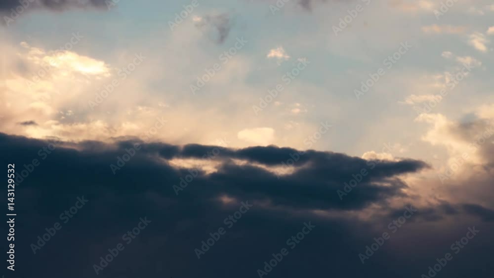 Short timelapse of storm clouds taking over a golden sunset in ultra HD Short timelapse of storm clouds taking over a golden sunset in ultra HD