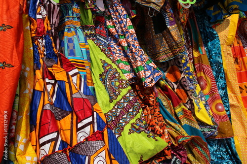 Traditional African Textiles   Beautiful decorated stalls offer colorful African Textiles in Lom    Togo  West Africa.  