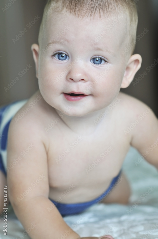 Baby smiling and looking at camera Baby smiling and looking at camera
