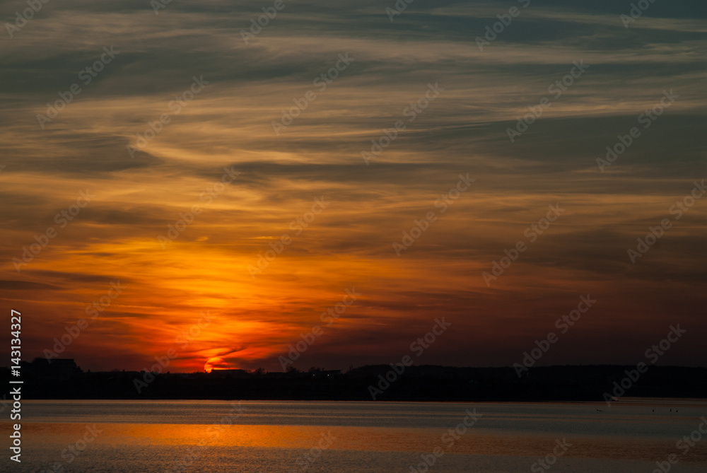 beautiful sunset sky over bucharest lake lacul morii