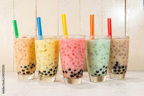 Boba / Bubble tea. Homemade Various Milk Tea with Pearls on wooden table.