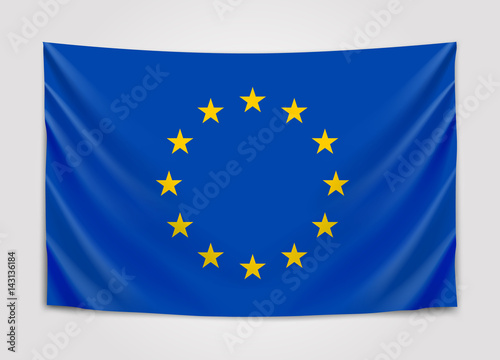 Hanging flag of Europe. European Union. European flag concept.