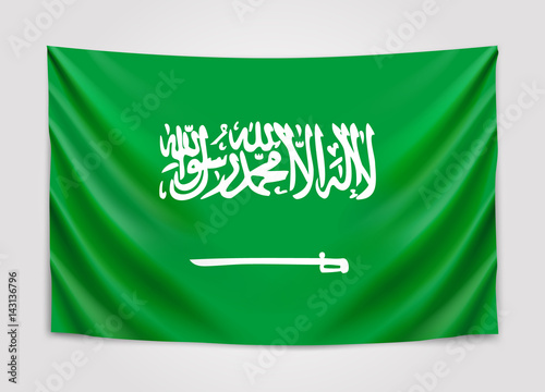 Hanging flag of Saudi Arabia. Kingdom of Saudi Arabia. National flag concept.