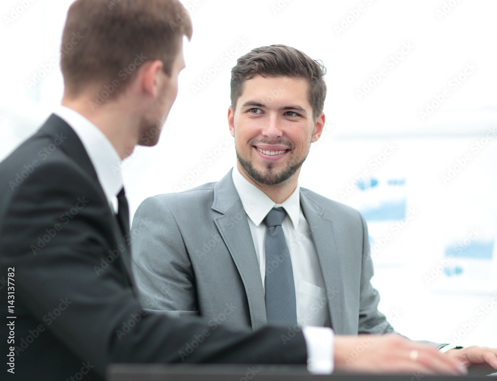 Fototapeta premium Business people at work. Two business people in formalwear discu