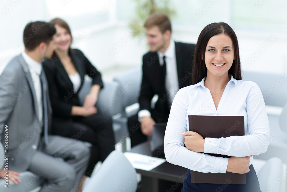 Portrait of businesswoman looking at camera on the background o Portrait of businesswoman looking at camera on the background o