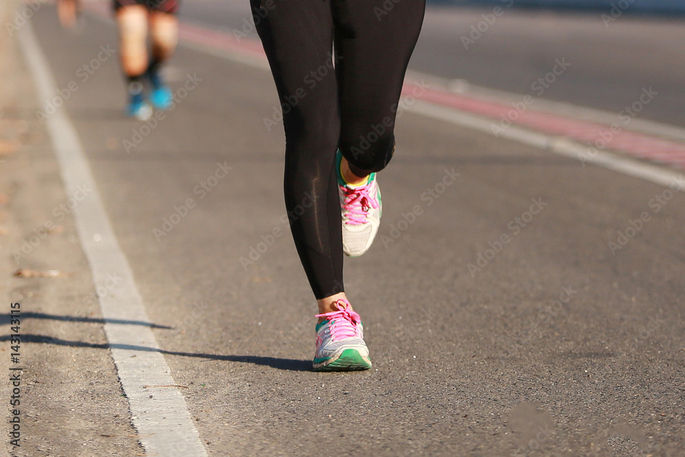 Naklejka premium marathon running on the road