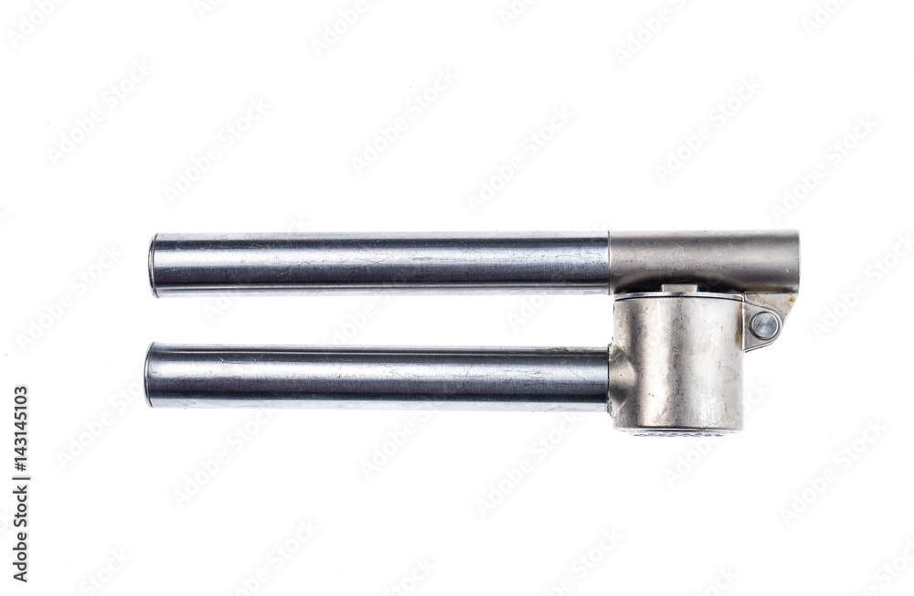Stainless steel garlic crusher or press for garlic and herbs.