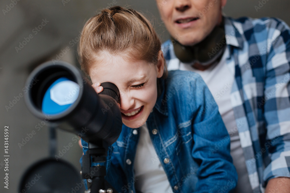 Cute pretty girl using optical equipment Cute pretty girl using optical equipment