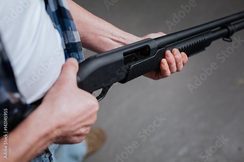 Dangerous weapon being in hands of a professional shooter