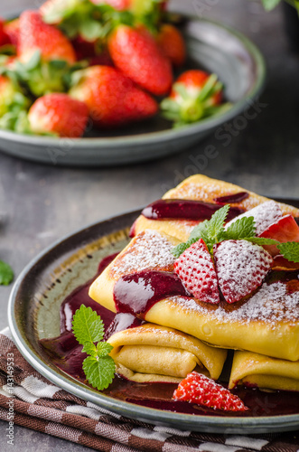 Filled pancakes with strawberries