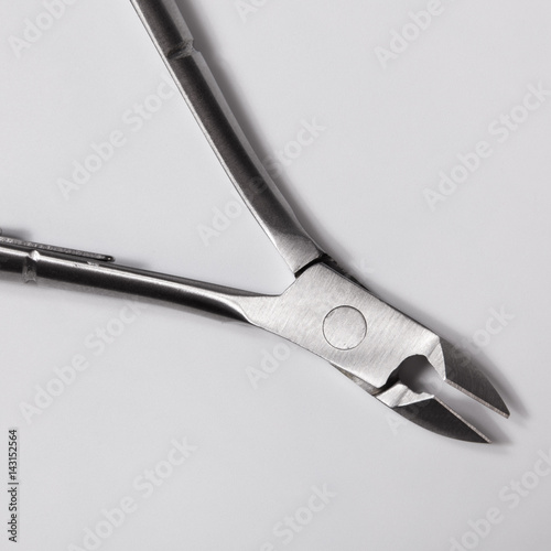 Close up metallic nail nipper on white background