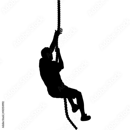 Black silhouette Mountain climber climbing a tightrope up on hands