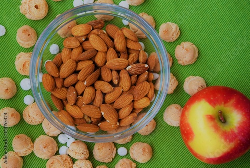 Goods of the day: almond, apple and some biscuits photo